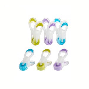 Segtukai skalbiniams plastikiniai su silikonu 16 vnt spalvoti 7x2x4 cm 50361